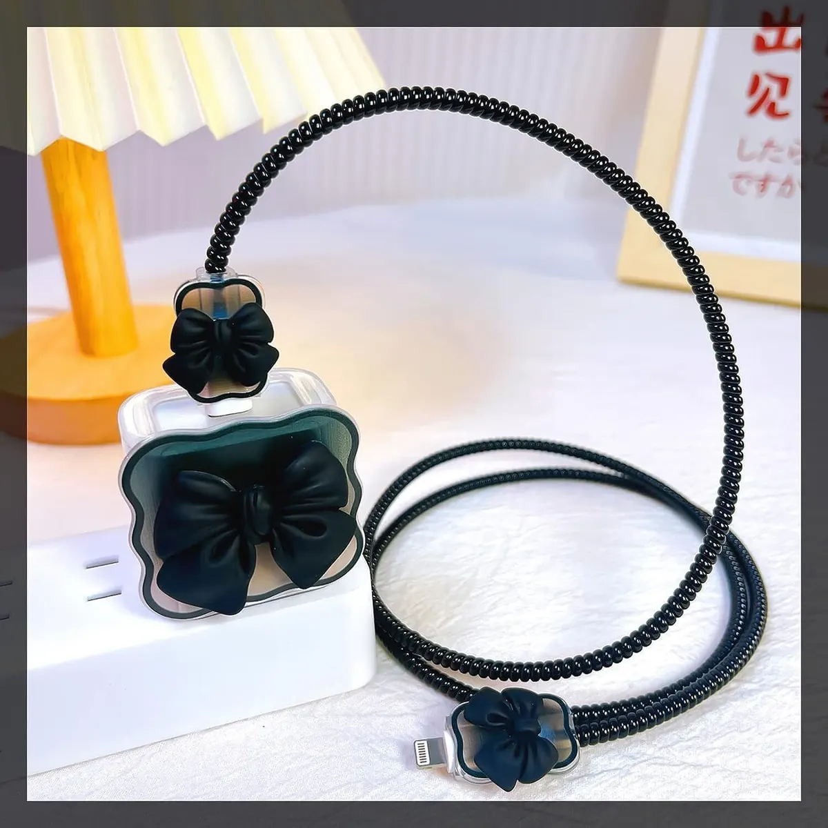 Xolia Chrg_iphn_BowTie Black Cable Protector (Black) — image 3 of 5